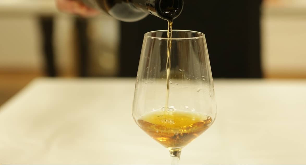 Whiskey being poured into a glass