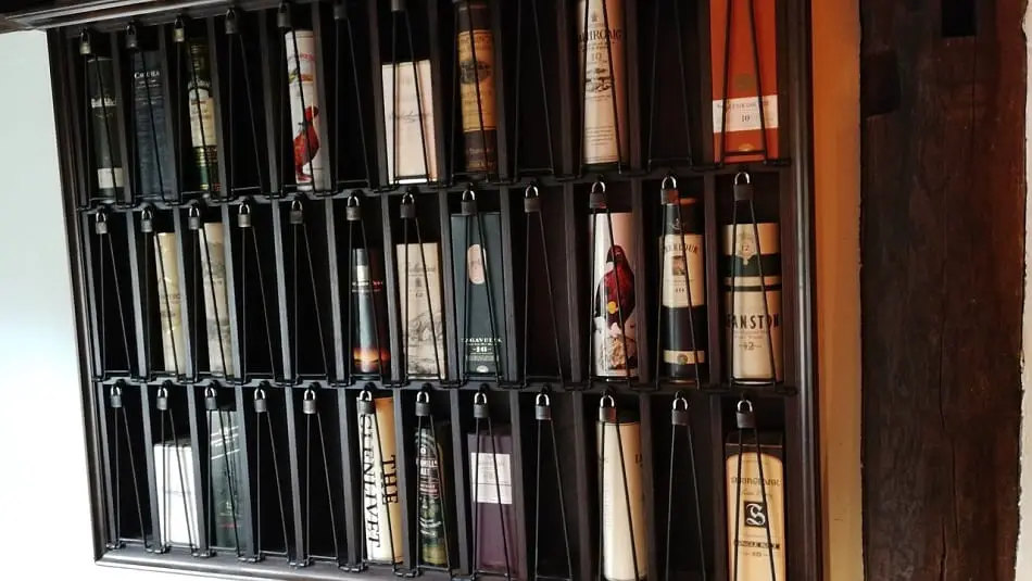 Whiskey bottles stored in a secure cabinet