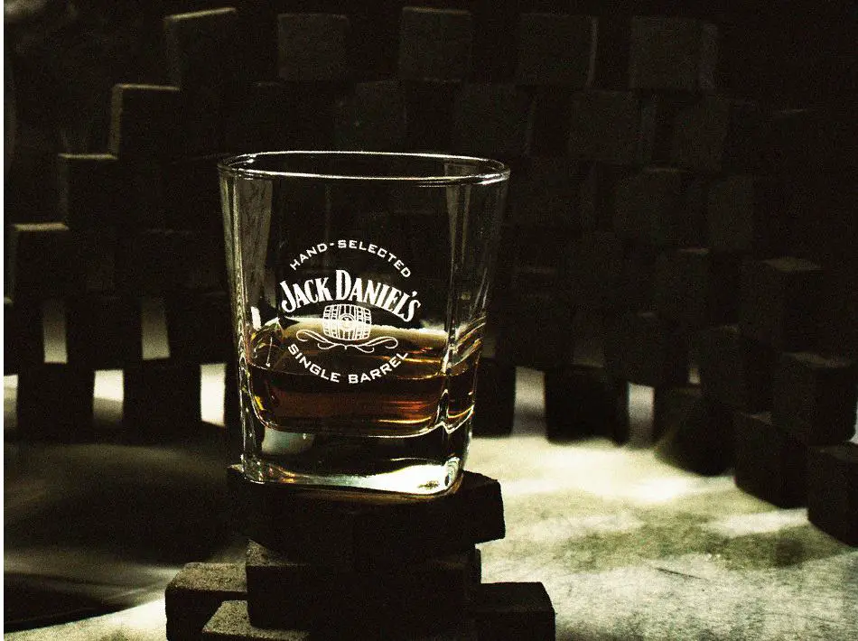 A glass of whiskey with the words ‘Jack Daniel’s Single Barrel’ written on it