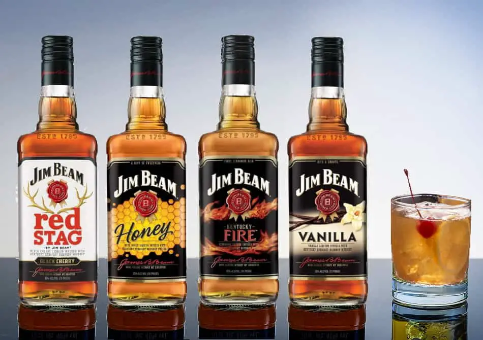 4 bottles of different Jim Beam flavored whiskey liqueurs and a whiskey cocktail