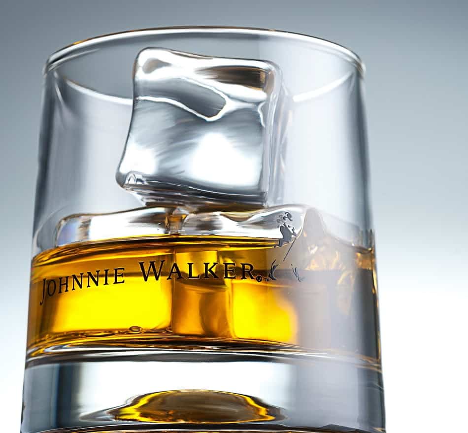 Johnny Walker glass of whisky with ice