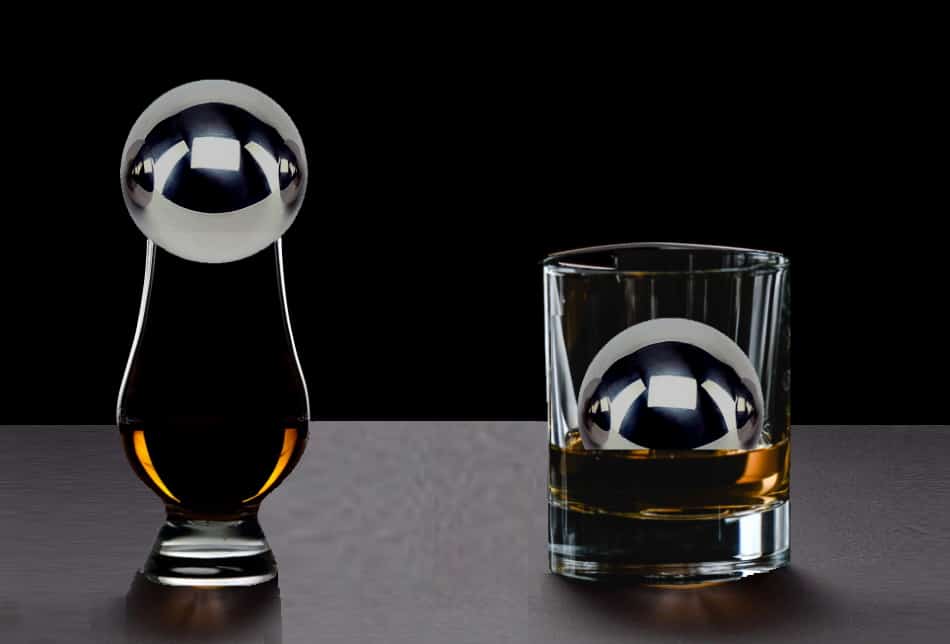 Large steel whiskey stone fitting into tumbler but not nosing glass
