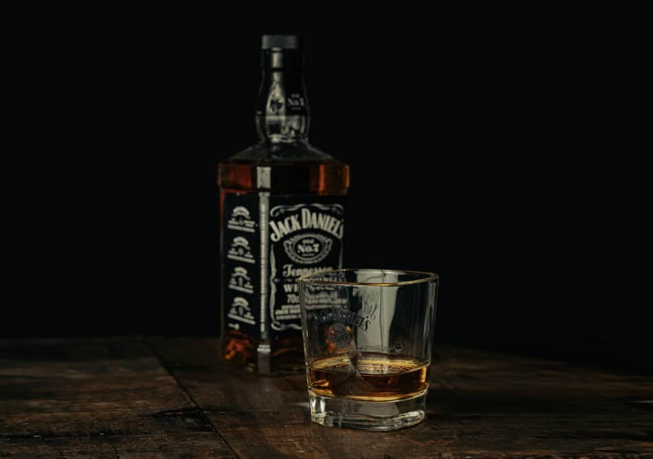 A bottle of Jack Daniel’s and a glass of Jack Daniel’s