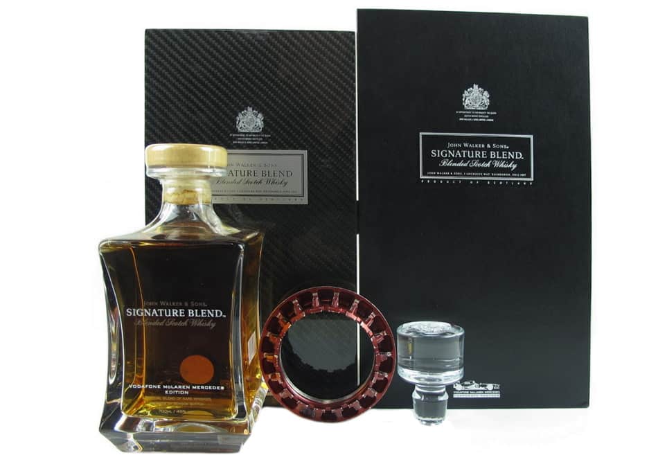 A bottle of John Walker & Sons Signature Blend, Vodafone McLaren Mercedes Edition in decanter and box