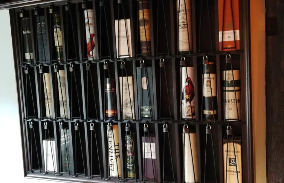 Bottles of whiskey stored in a rack