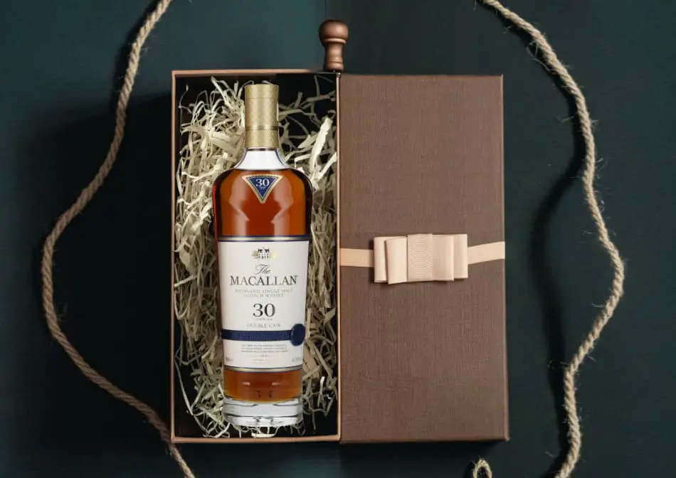 A bottle of whiskey in a gift box